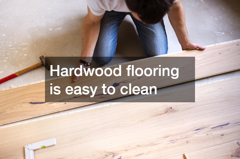 man installing hardwood floors